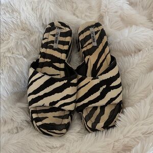 Chic Zebra Print Mules in Black and Tan